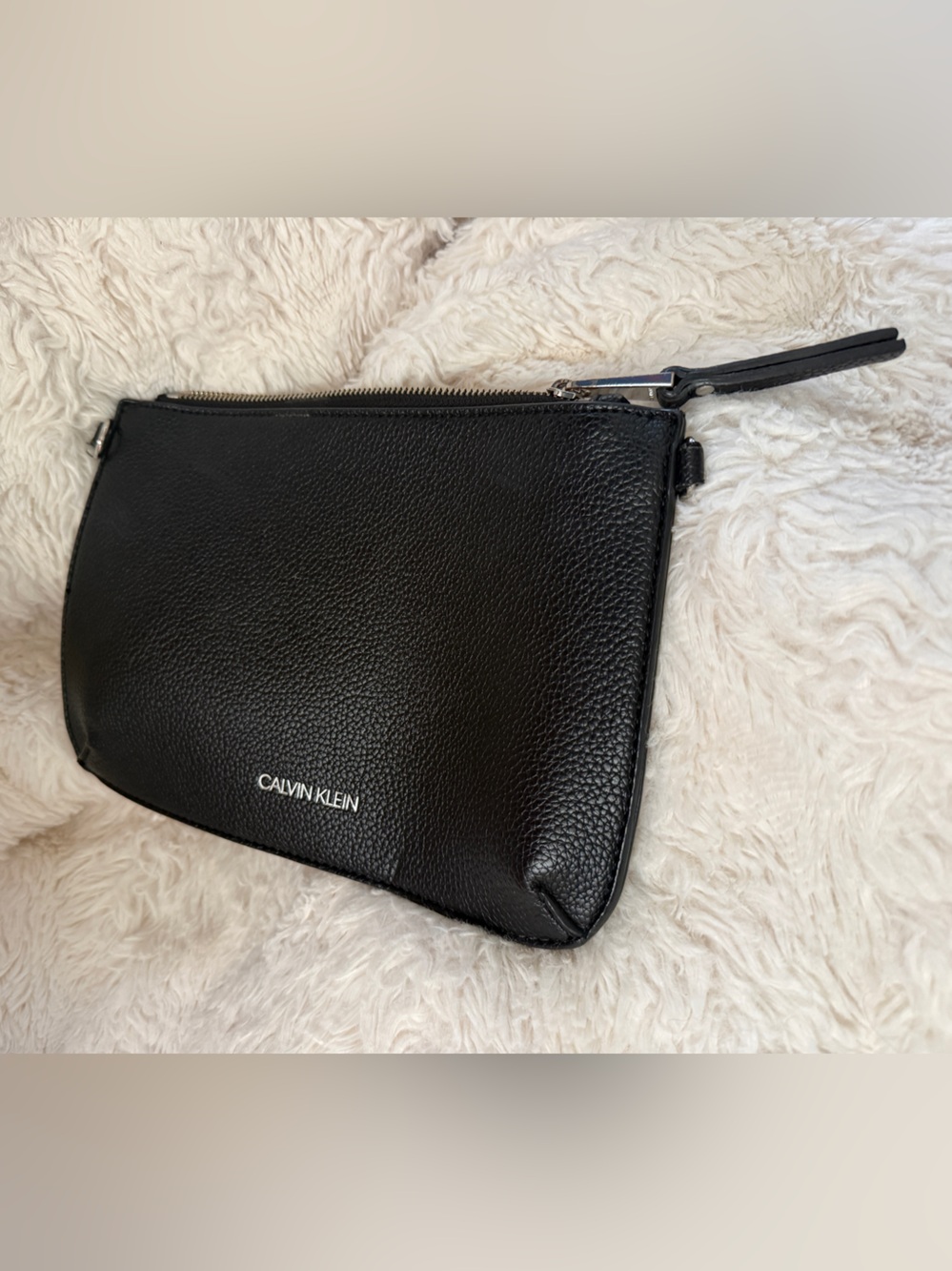 Calvin Klein Black Pebbled Leather Pouch, clutch or add a strap for crossbody.
